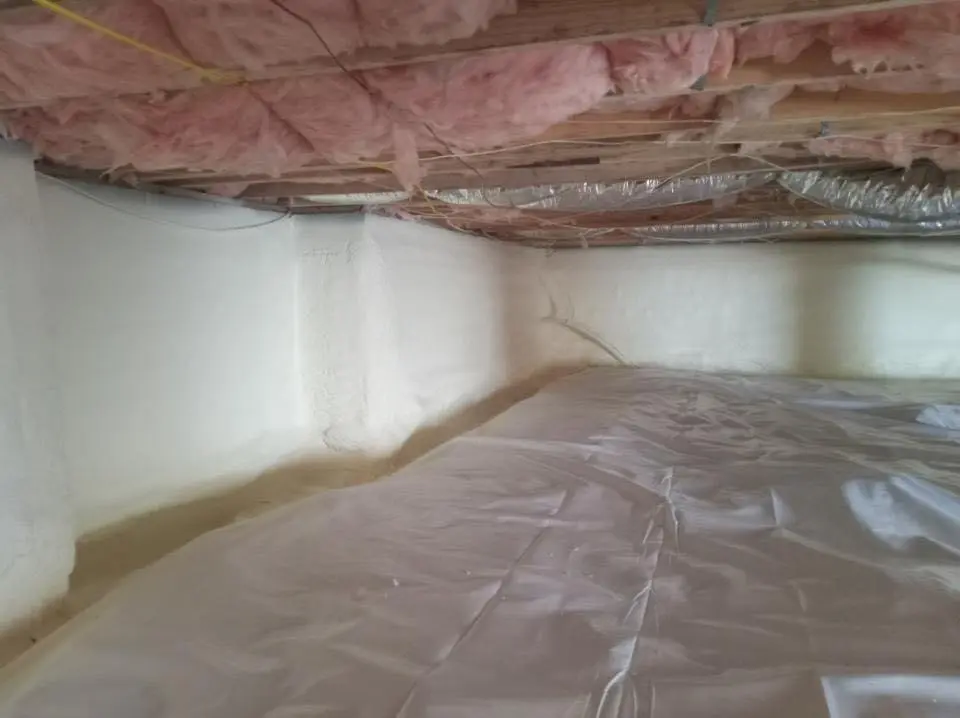 Crawl space encapsulation with closed-cell spray foam for Commercial Roof Restoration in Charleston